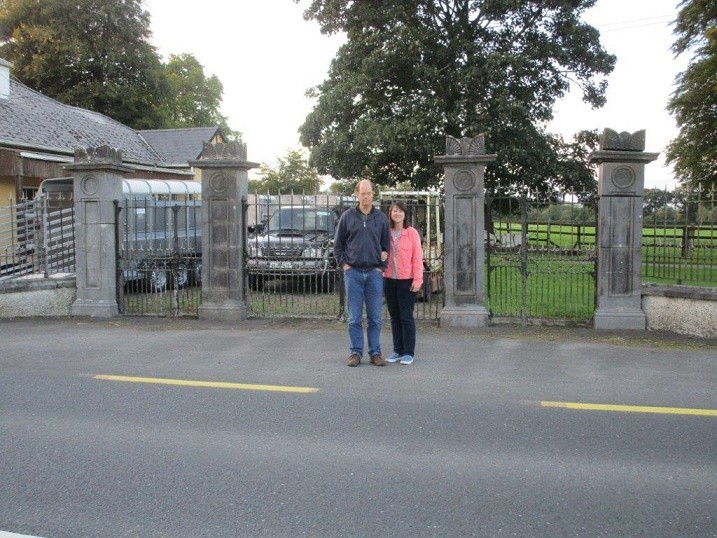 Bill and Lucy at entrance gate to Maher Property
